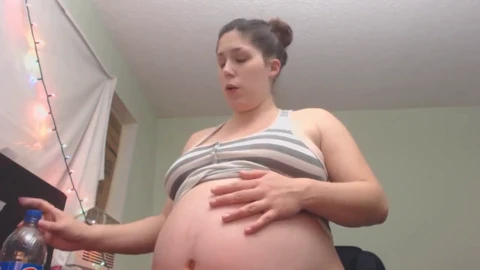 Busty pregnant amateur Soda gets bloated while enjoying soda!