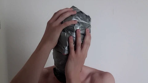 Bondage, rubber hood, trash bag